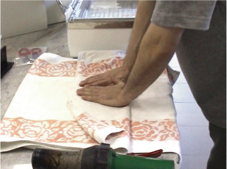 Hand press with towel